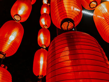 Low angle view of illuminated lanterns hanging