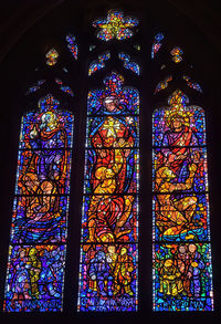 Low angle view of stained glass window in temple