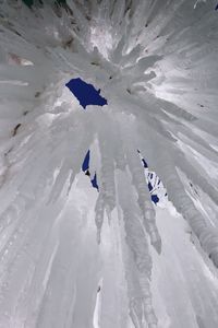 High angle view of people on snowcapped mountain