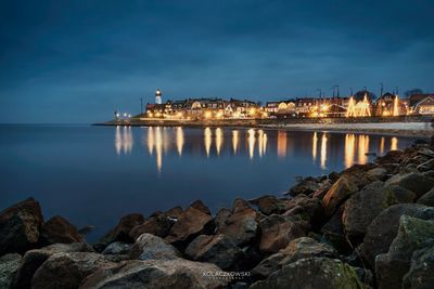 Scenic view of sea against sky at night