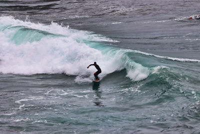 Man surfing in sea