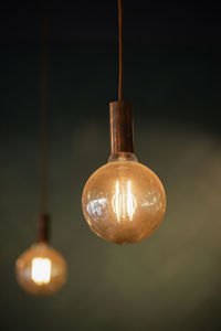 Close-up of illuminated light bulb