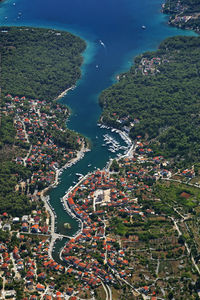 High angle view of cityscape and sea