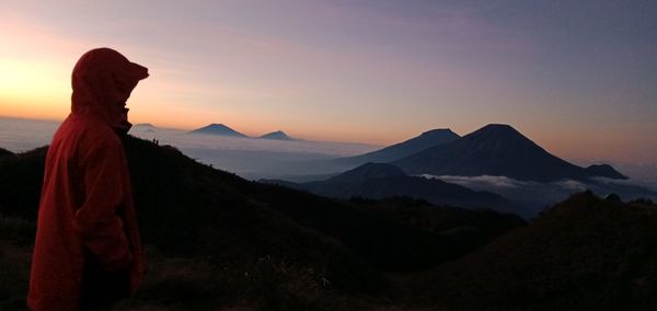 Scenic view of mountains against sky during sunset