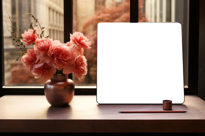 Close-up of flowers on table