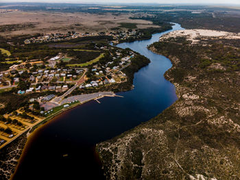 High angle view of river amidst buildings in city