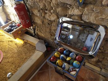High angle view of fruits on table against wall