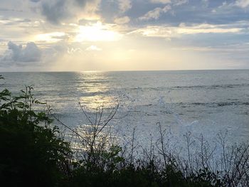 Scenic view of sea against sky at sunset