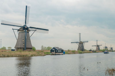 Traditional windmill against sky