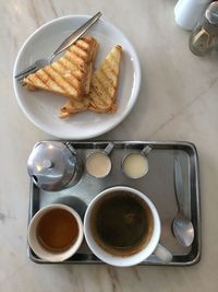 High angle view of breakfast served on table