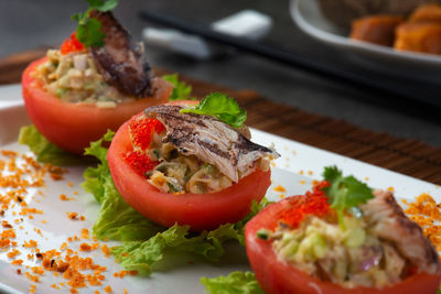 Close-up of salad served in plate on table