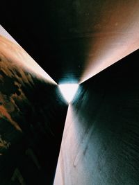 Illuminated tunnel by sea