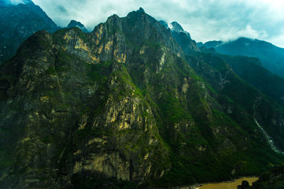 Scenic view of rocky mountains against sky