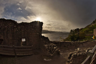 Panoramic view of sea and buildings against sky