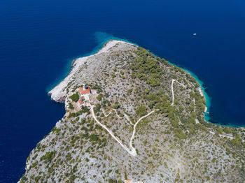 High angle view of sea amidst buildings