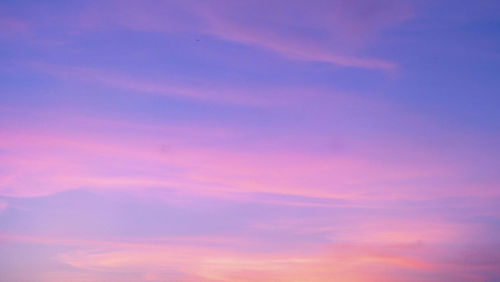 Low angle view of dramatic sky during sunset