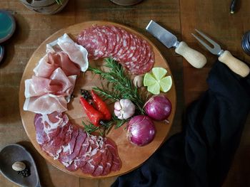 High angle view of vegetables on cutting board