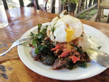 High angle view of breakfast in plate on table