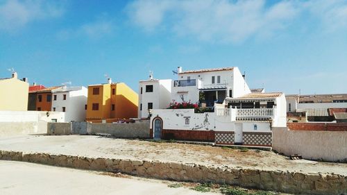 Houses against blue sky