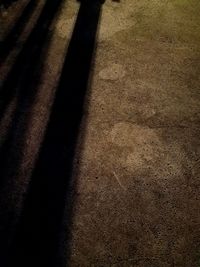 High angle view of shadow on sand