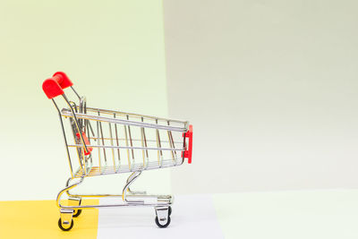 Shopping cart against white background