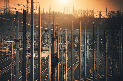 High angle view of railroad tracks against sky during sunset