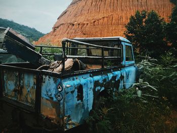 Abandoned truck on field