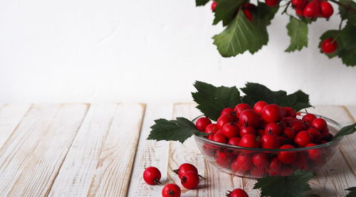 Close-up of red fruits on table