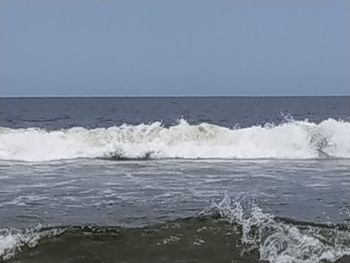 Scenic view of sea against clear sky