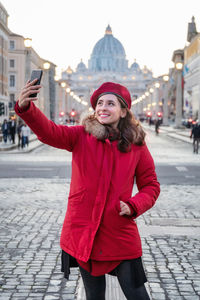 Portrait of a smiling young woman in winter