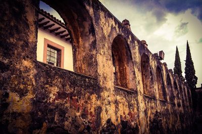 Low angle view of built structure against the sky