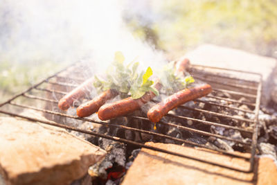 Close-up of meat on barbecue grill