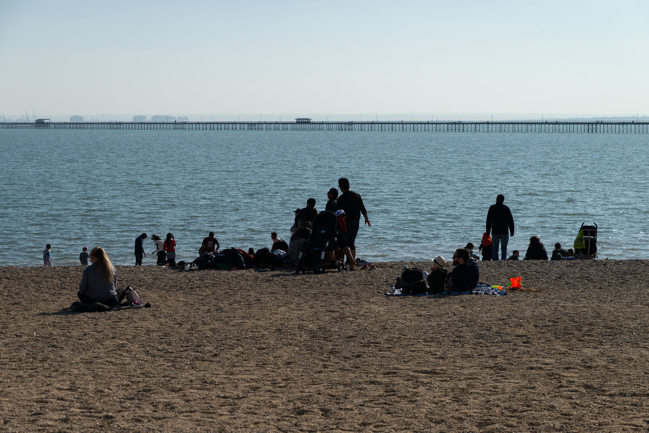 GROUP OF PEOPLE ON BEACH