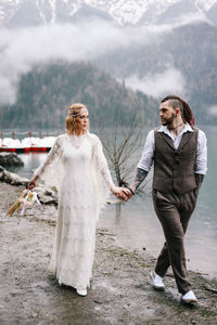 Young couple standing on mountain