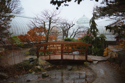 Gazebo in park against buildings