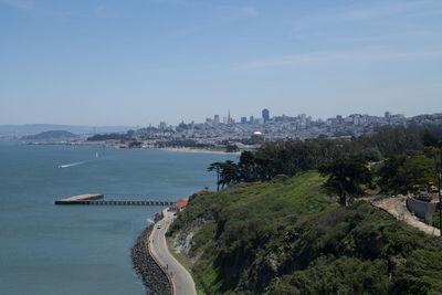 View of sea with buildings in background