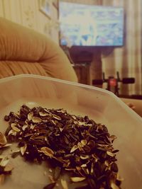 Close-up of chopped in bowl on table at home