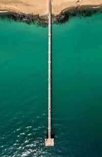 High angle view of swimming pool by sea