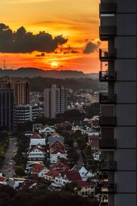 High angle view of buildings against sky during sunset