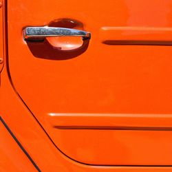 Full frame shot of orange car door