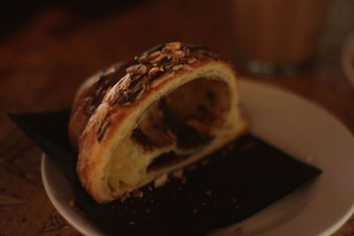 Close-up of bread slice in plate on table