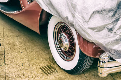 Low section of bare feet in car