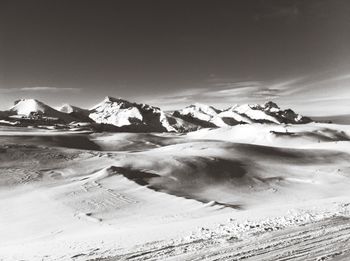Scenic view of snow covered mountains