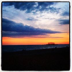 Scenic view of sea at sunset