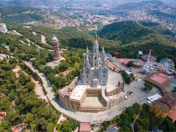 Temple of the sacred heart of jesus, tibidabo amusement park, and tower of waters of two rivers