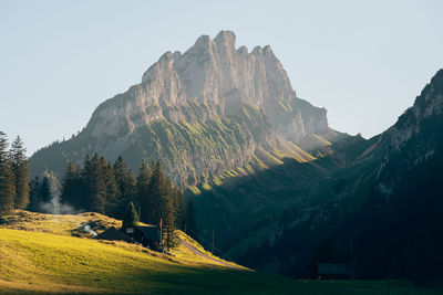 Scenic view of mountains against clear sky