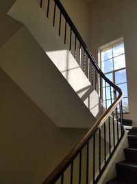 Low angle view of spiral staircase in building