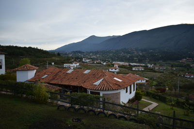 High angle view of houses against sky