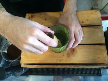 High angle view of man working on table