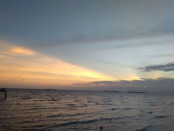 Scenic view of sea against dramatic sky